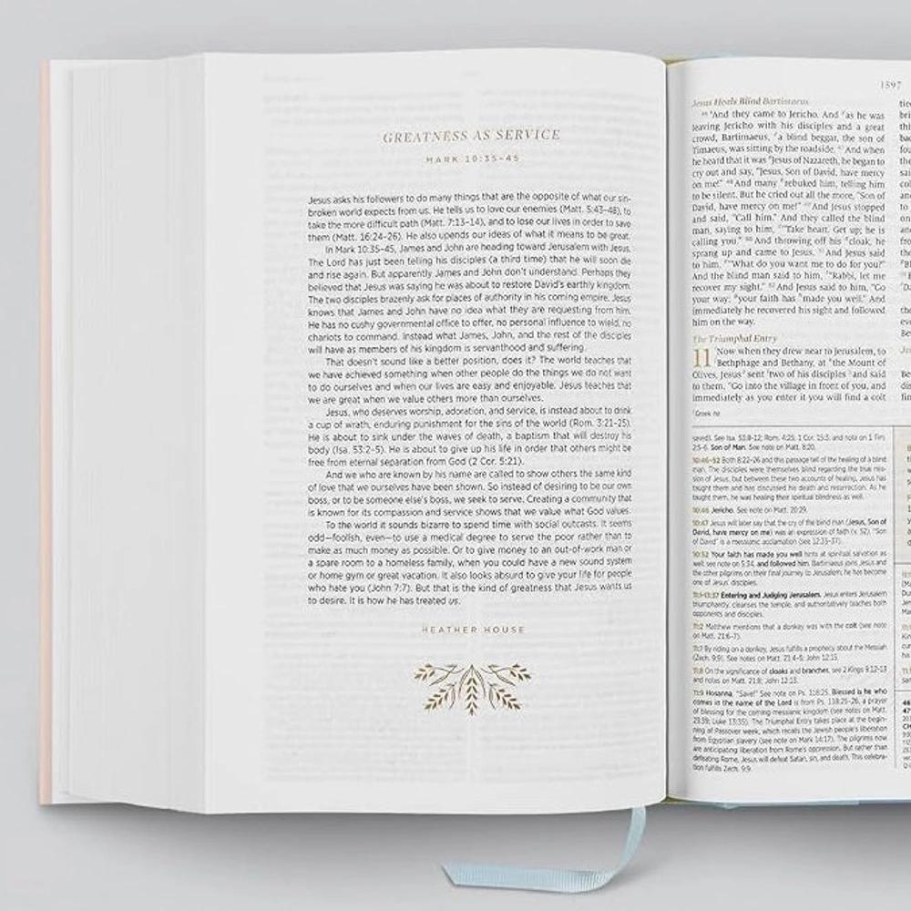 Open ESV Women's Study Bible showing Scripture, study notes and a floral page ornament.