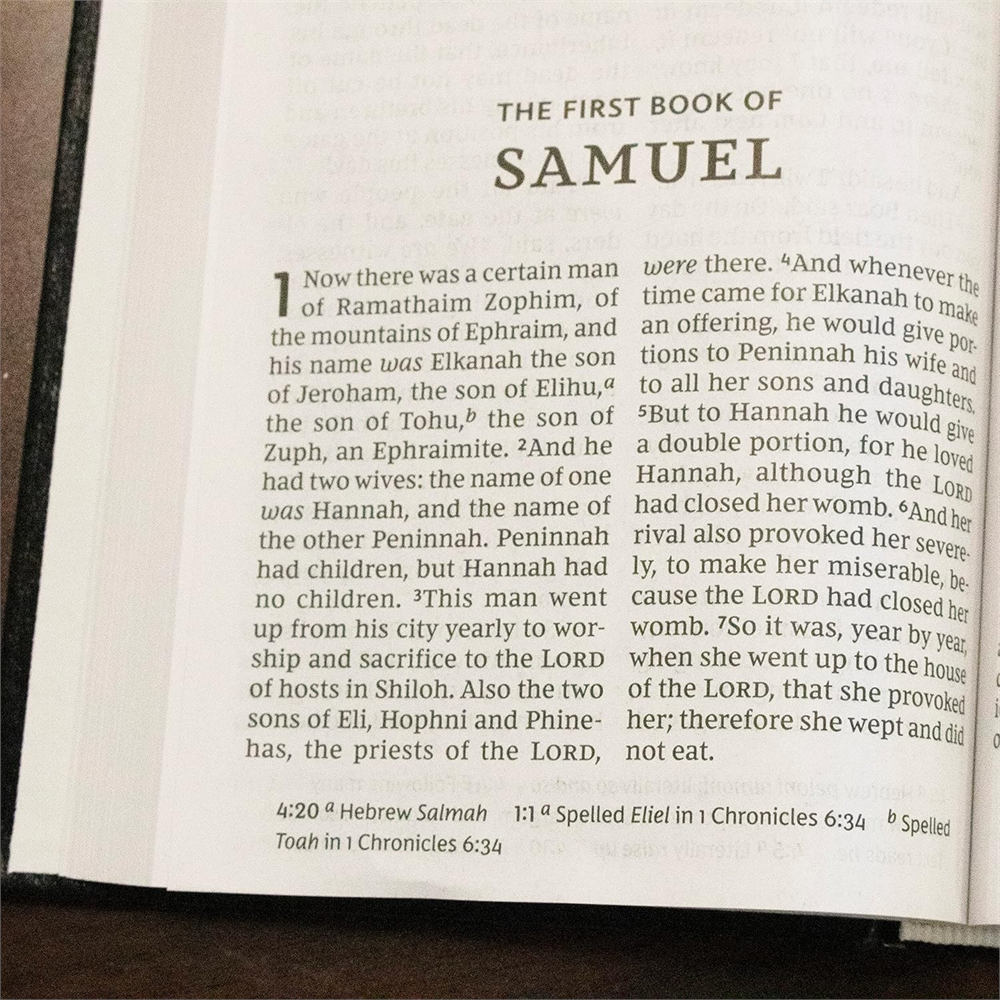 NKJV Pew Bible, Large Print open to the first chapter of 1 Samuel with footnotes below the double-column text.