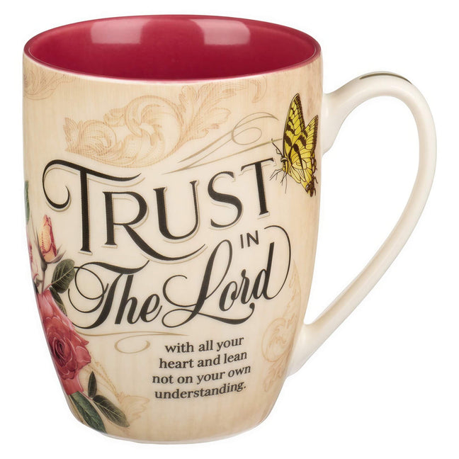 Trust in the Lord mug with flowers and butterflies and a pink interior.
