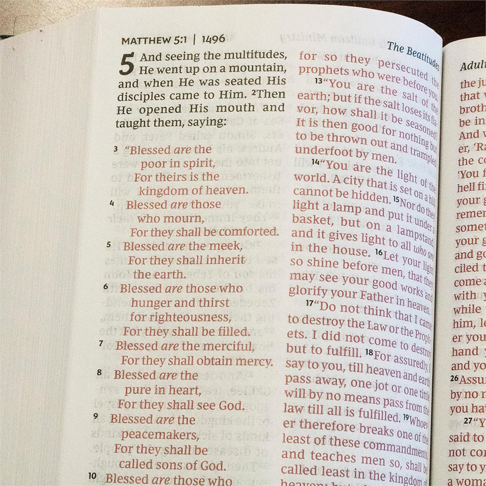 NKJV Pew Bible, Large Print showing Matthew 5 with the words of Jesus printed in red.