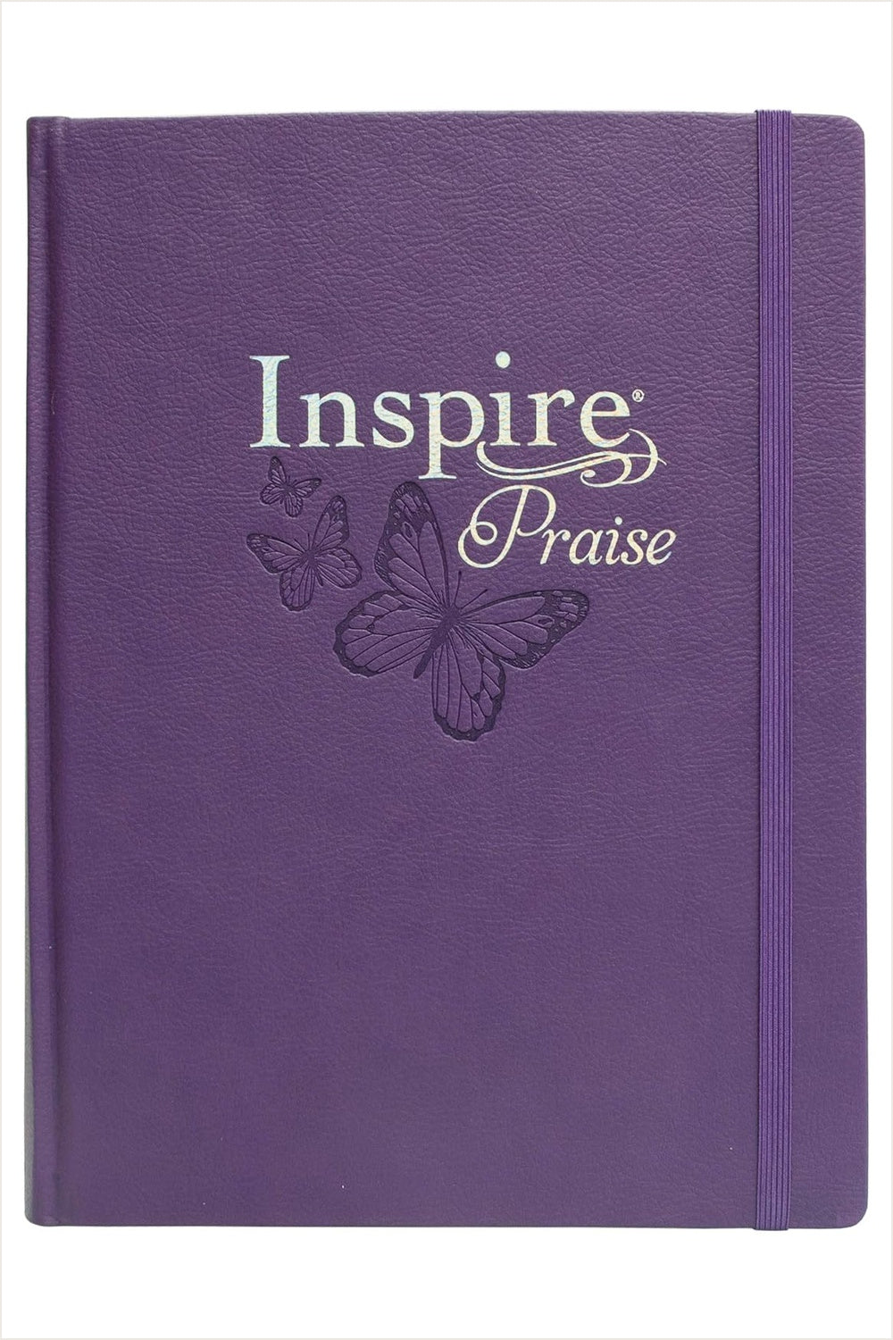 Purple NLT Inspire Praise Large Print Bible with silver title lettering, embossed flowers, and an elastic closure.